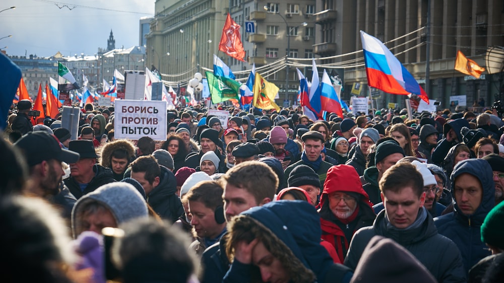 people gathering on street during daytime