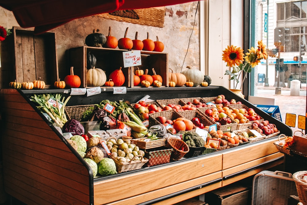 variety of fruits on brown wooden crate