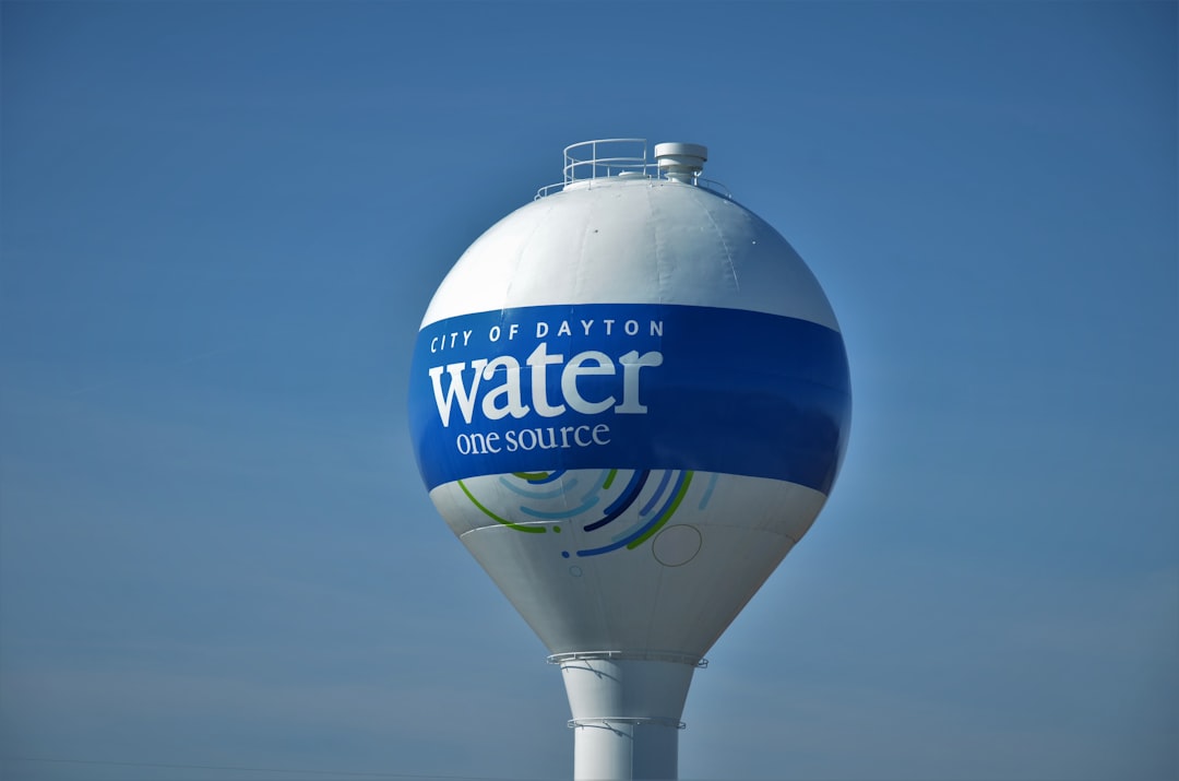 a large water tower with a sky background, Dayton Ohio Water Tower