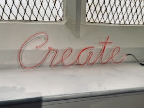 white and red love neon light signage