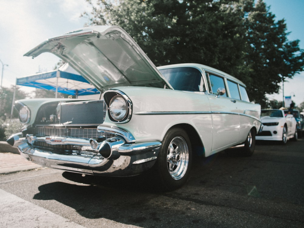 white and blue classic car