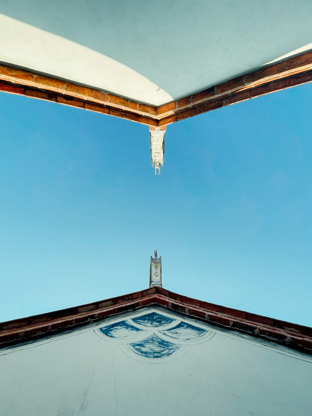 white and brown roof under blue sky during daytime