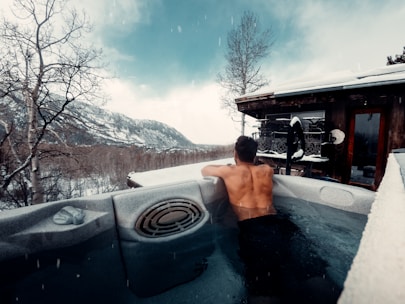 woman in swimming pool during daytime