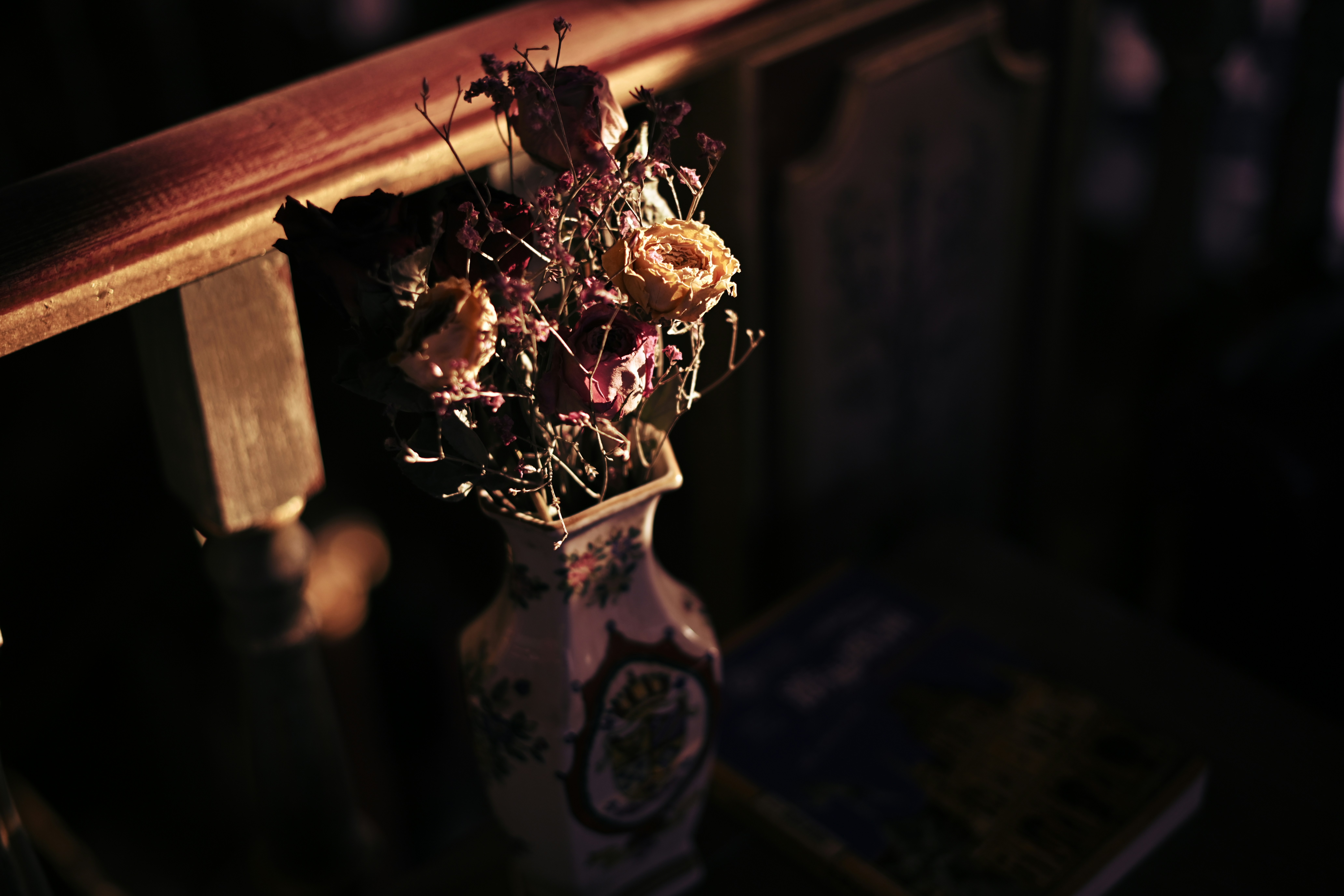 white and brown floral ceramic vase