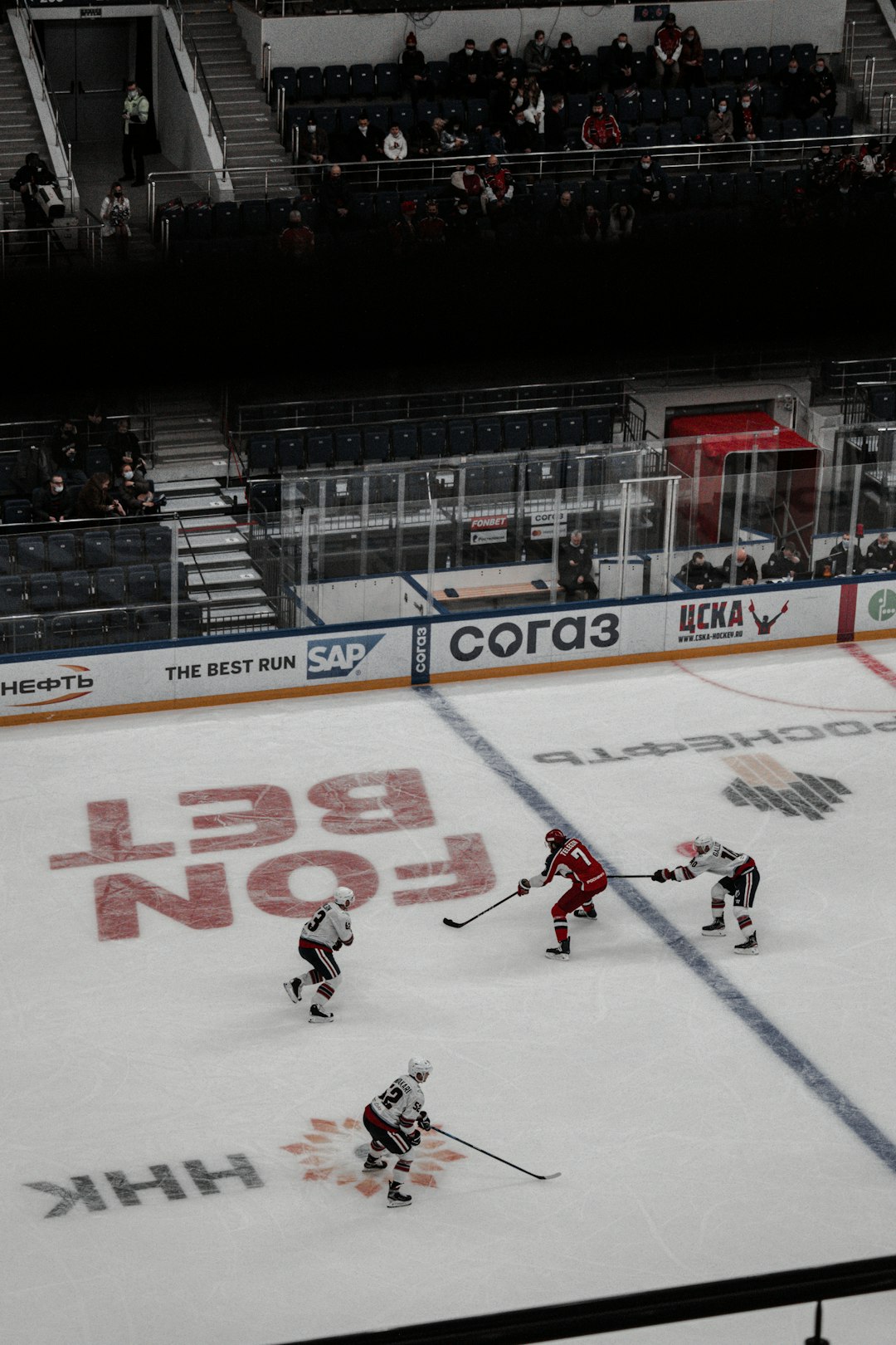 ice hockey players on ice hockey field