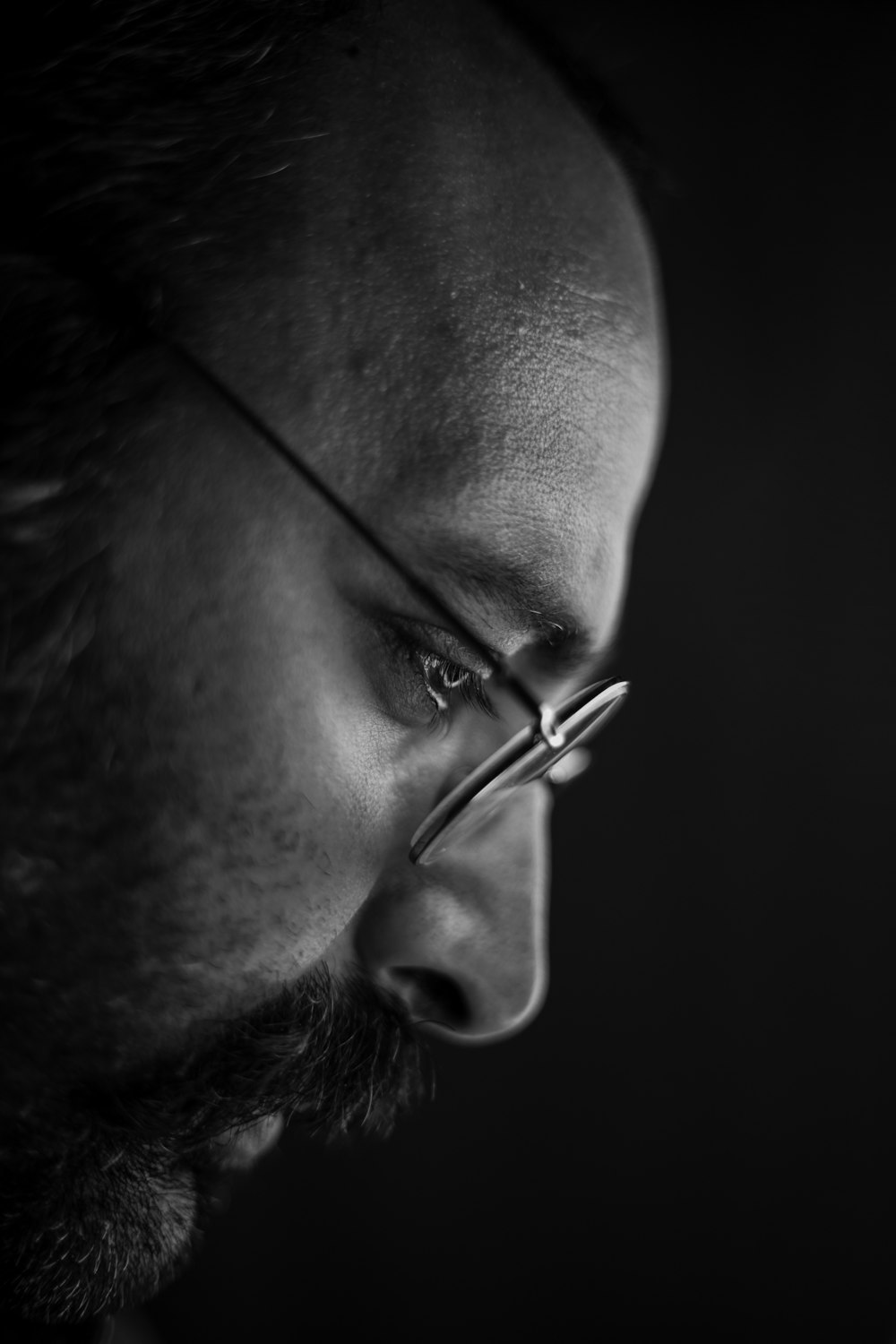 man wearing black framed eyeglasses