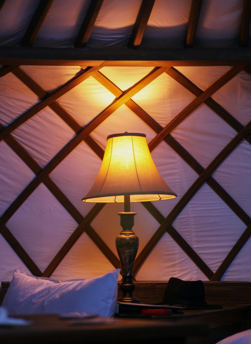 brown table lamp on brown wooden table