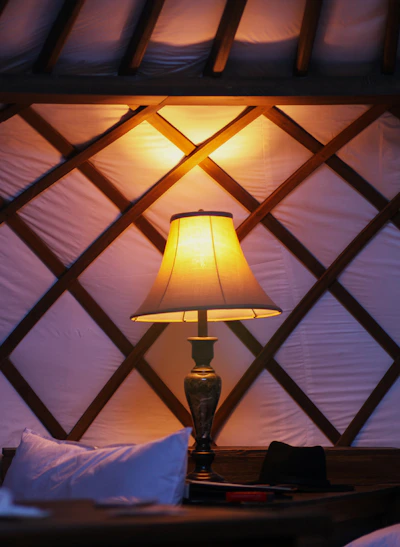 brown table lamp on brown wooden table