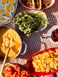 An overhead shot of a lively table spread featuring various vegan vulture dishes ready to be shared.
