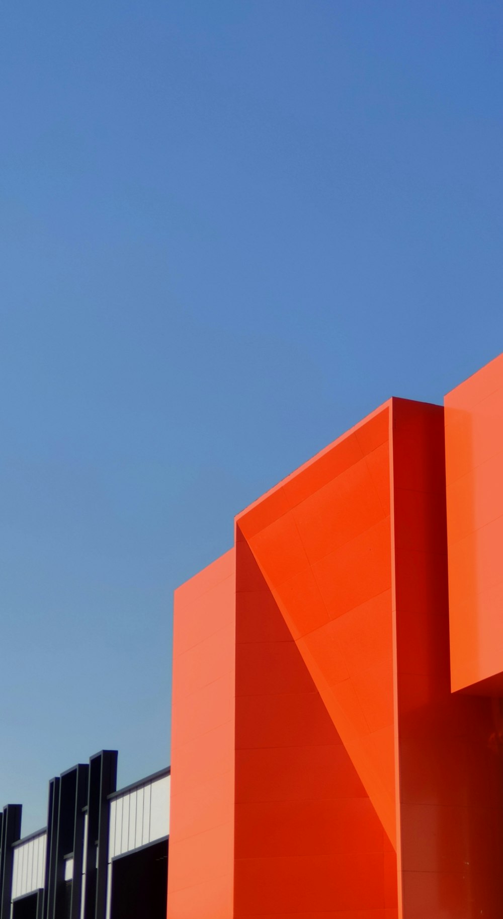 pink concrete building under blue sky during daytime