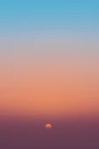 A serene digital card depicting a sunset gradient with soft animated sparkles.