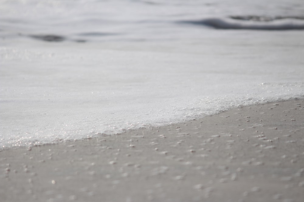 close up photo of white sand