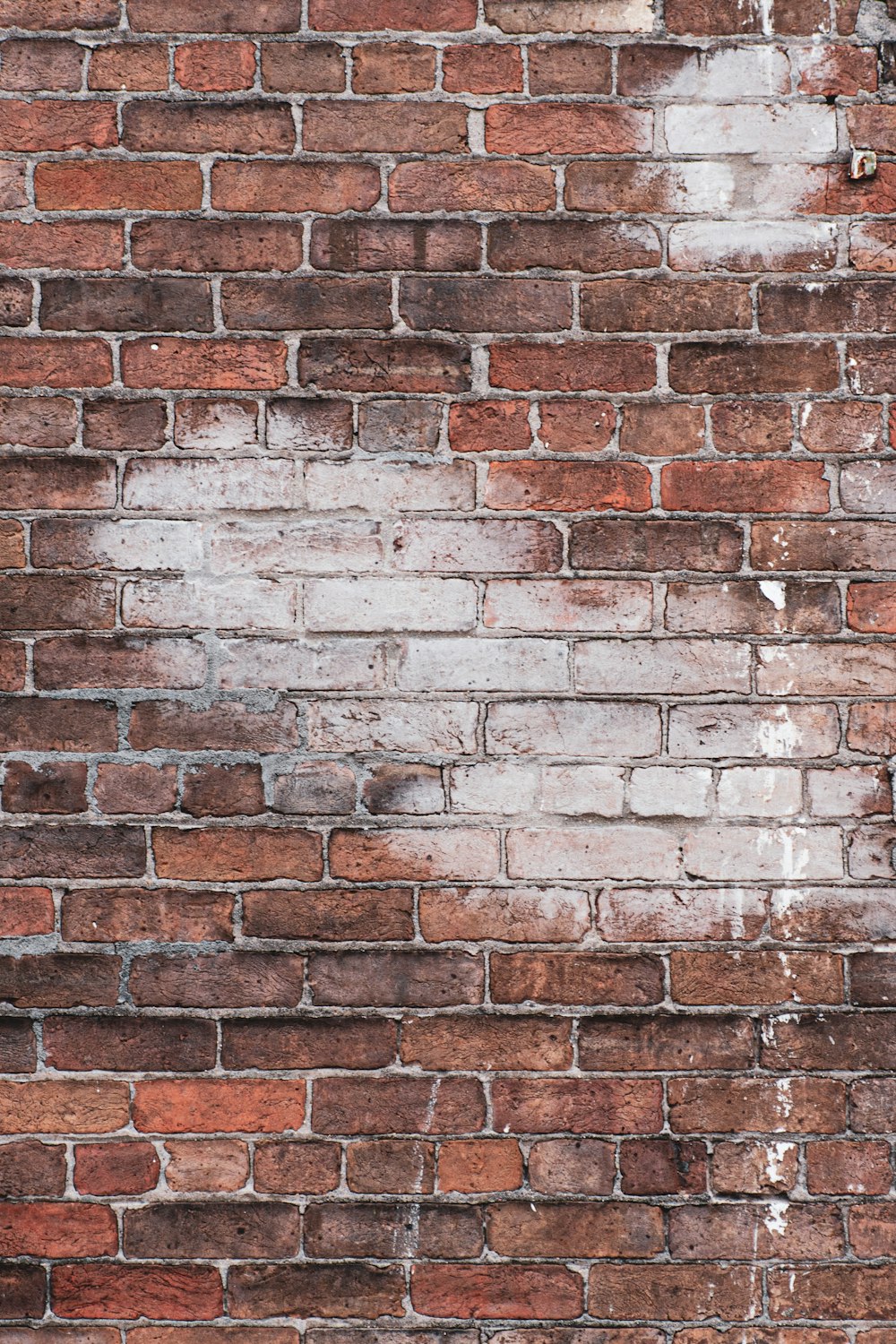 brown and gray brick wall