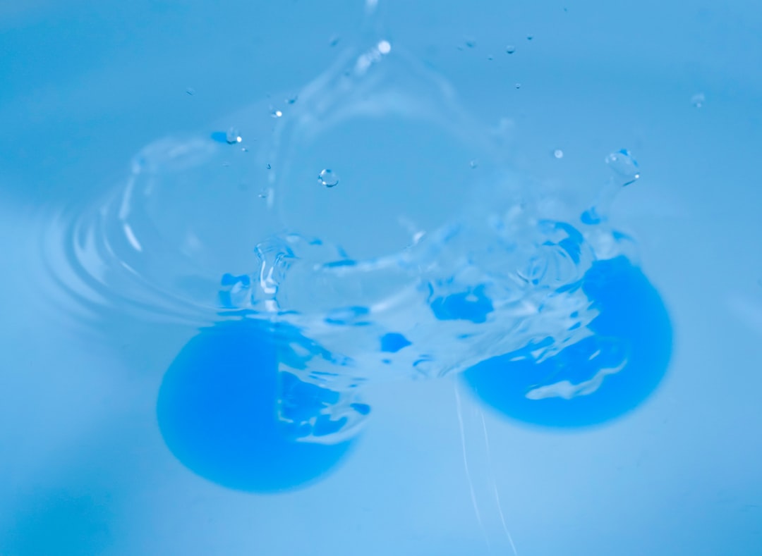 blue balloon floating on water