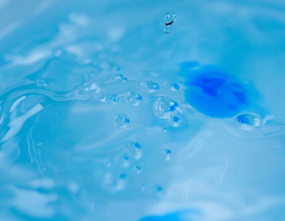 blue water drop on water