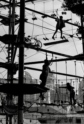Children enjoying a ropes course, demonstrating courage and balance.