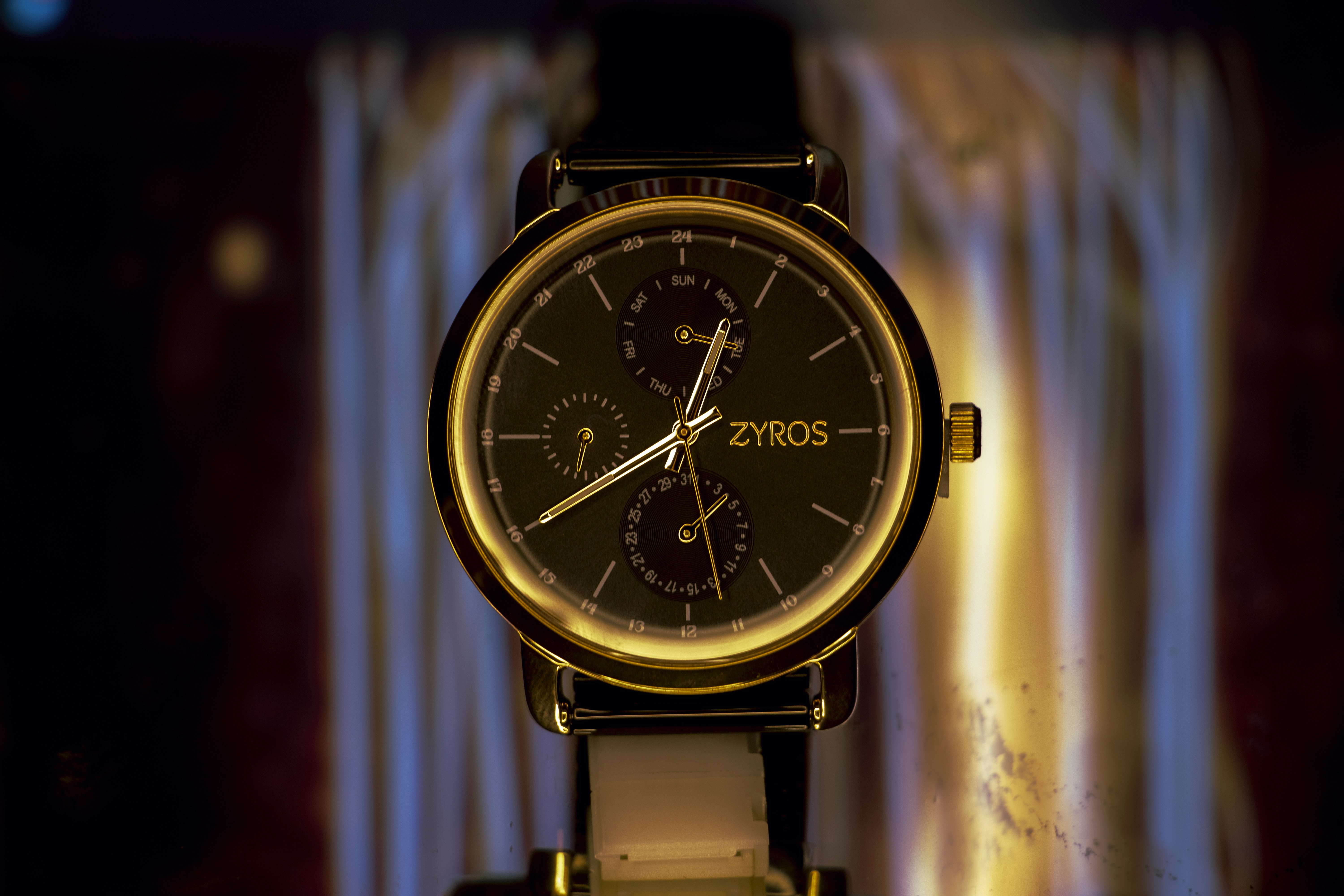 silver and black round chronograph watch