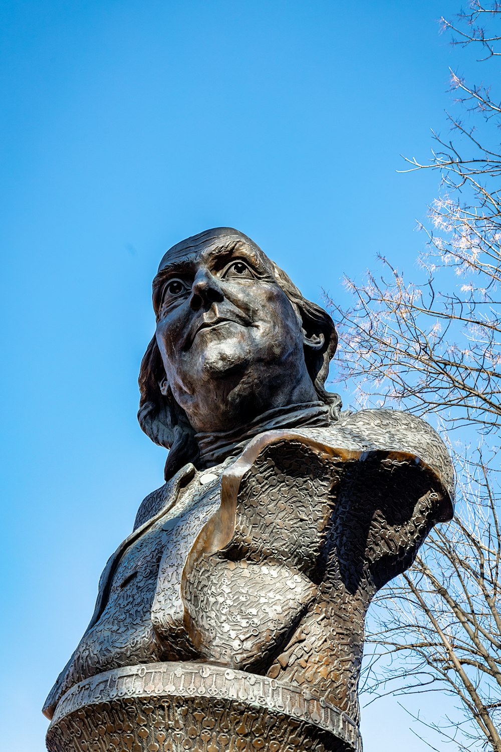 grey concrete statue of man