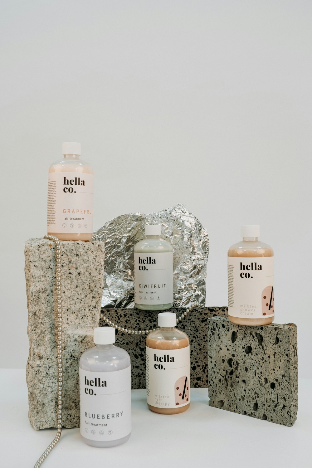 white and brown bottles on brown and black marble table