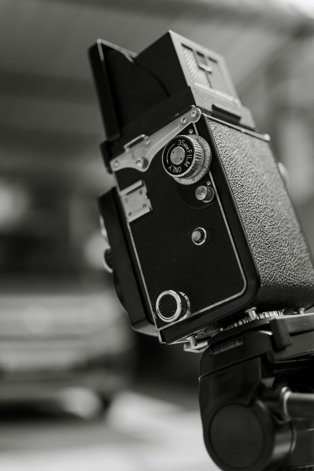 black and silver camera in grayscale photography