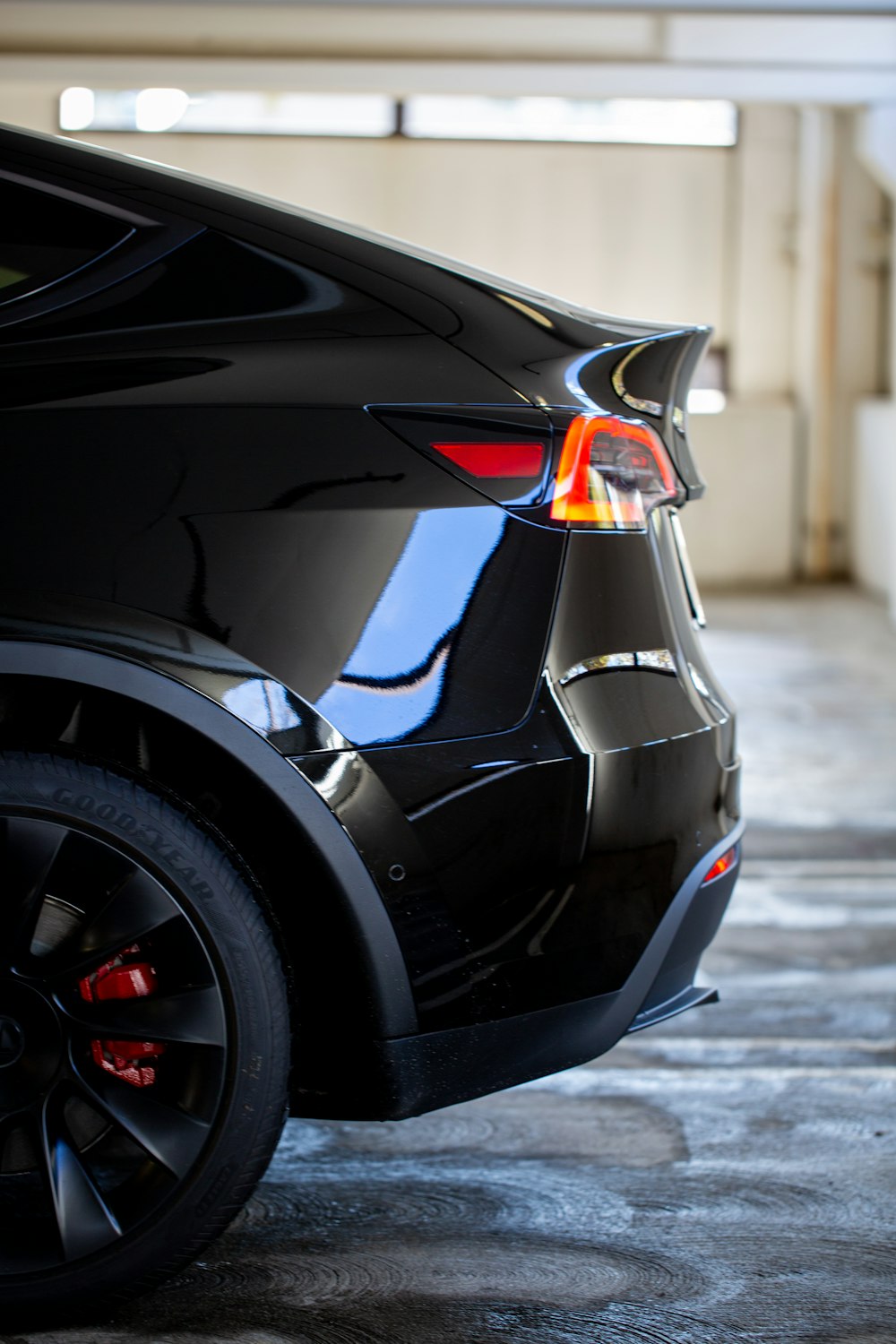 black car on gray concrete road