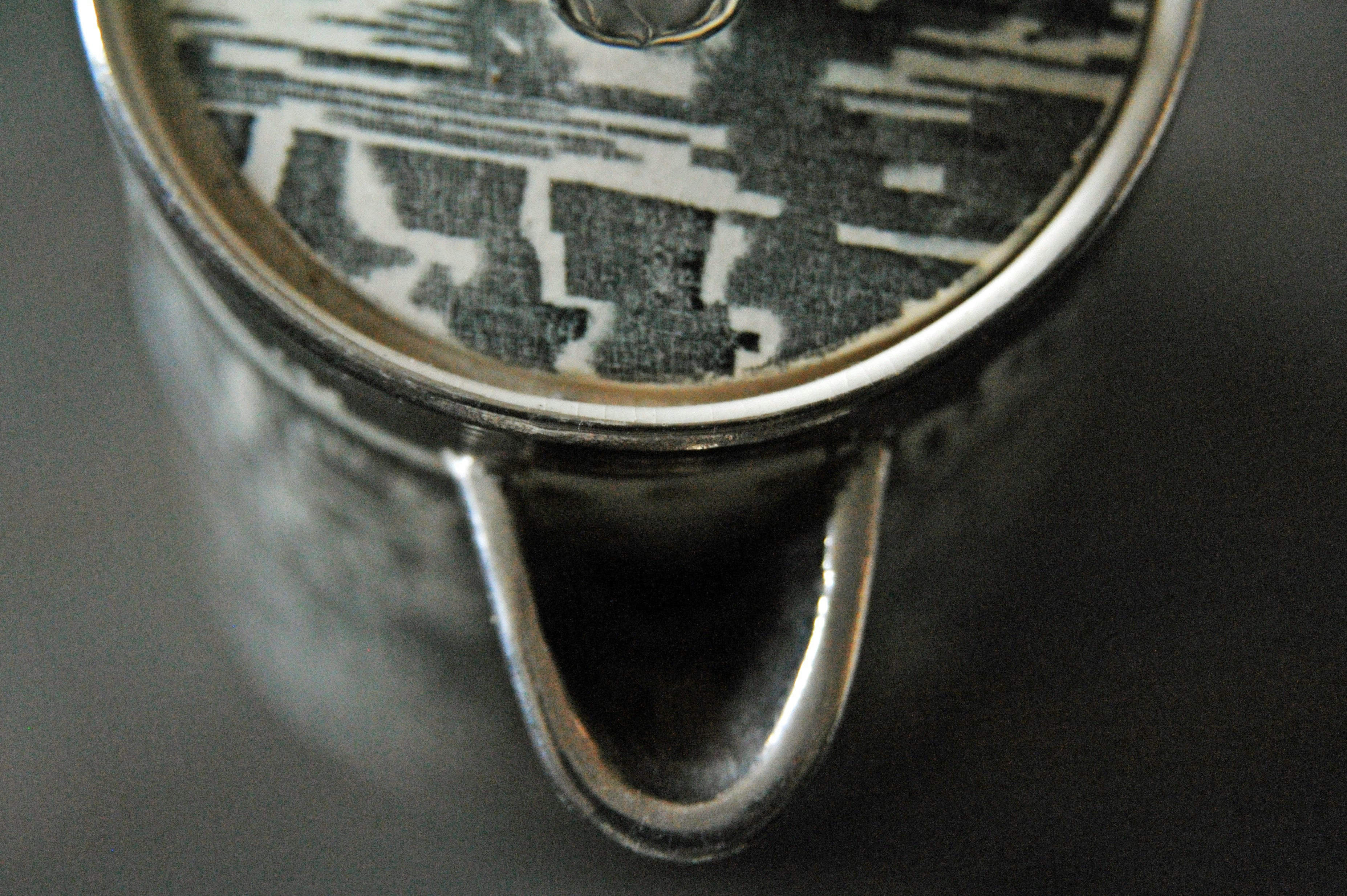 silver and black round analog watch