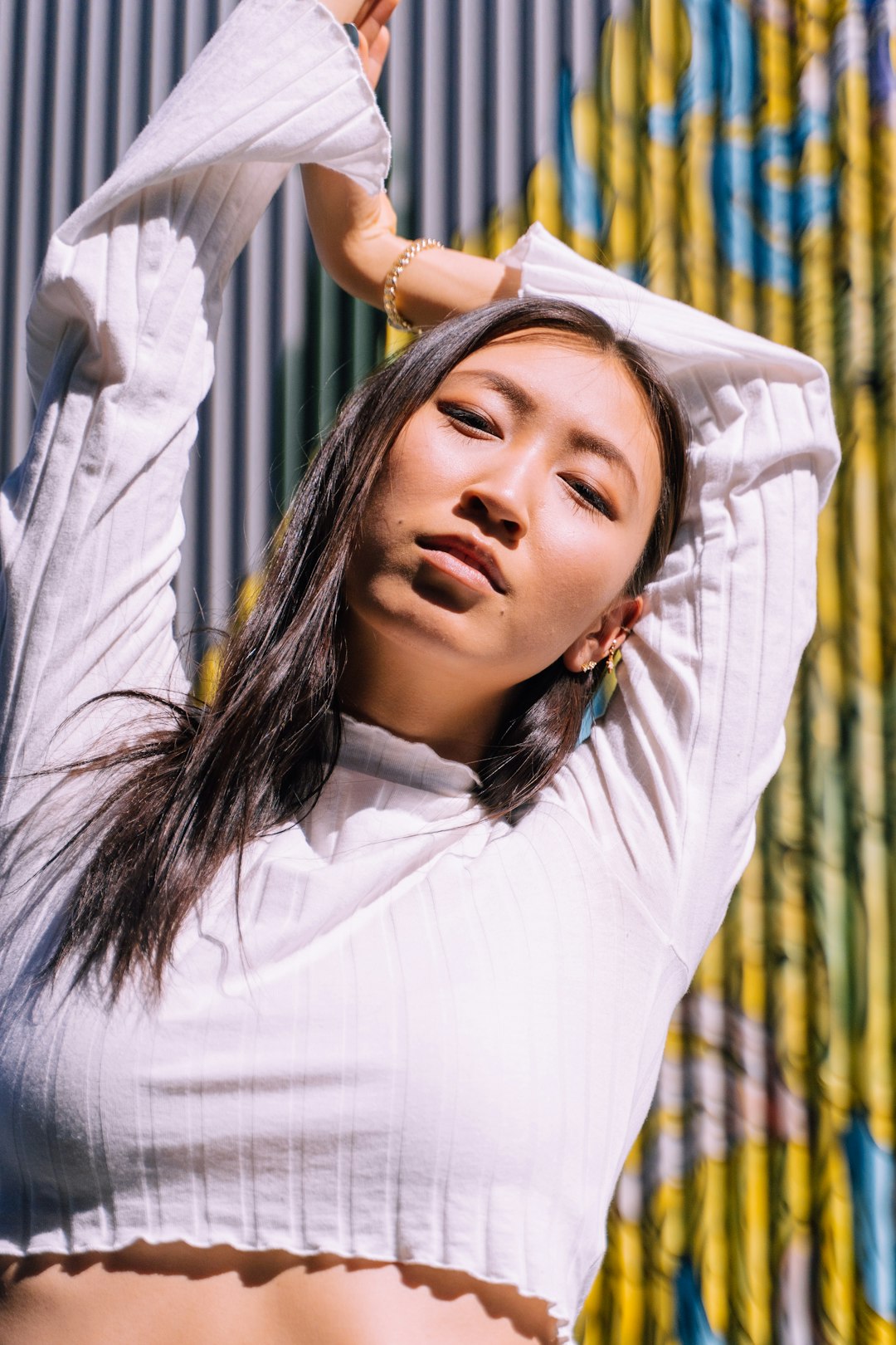 woman in white long sleeve shirt