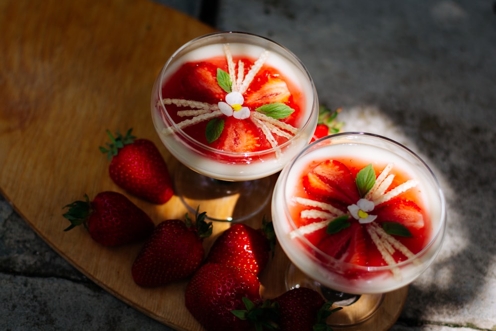 clear drinking glass with strawberry juice