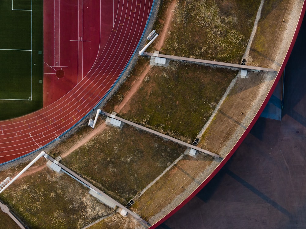 aerial view of green and brown stadium