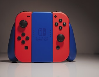 A vibrant Nintendo Switch with detachable Joy-Cons displayed on a wooden table.