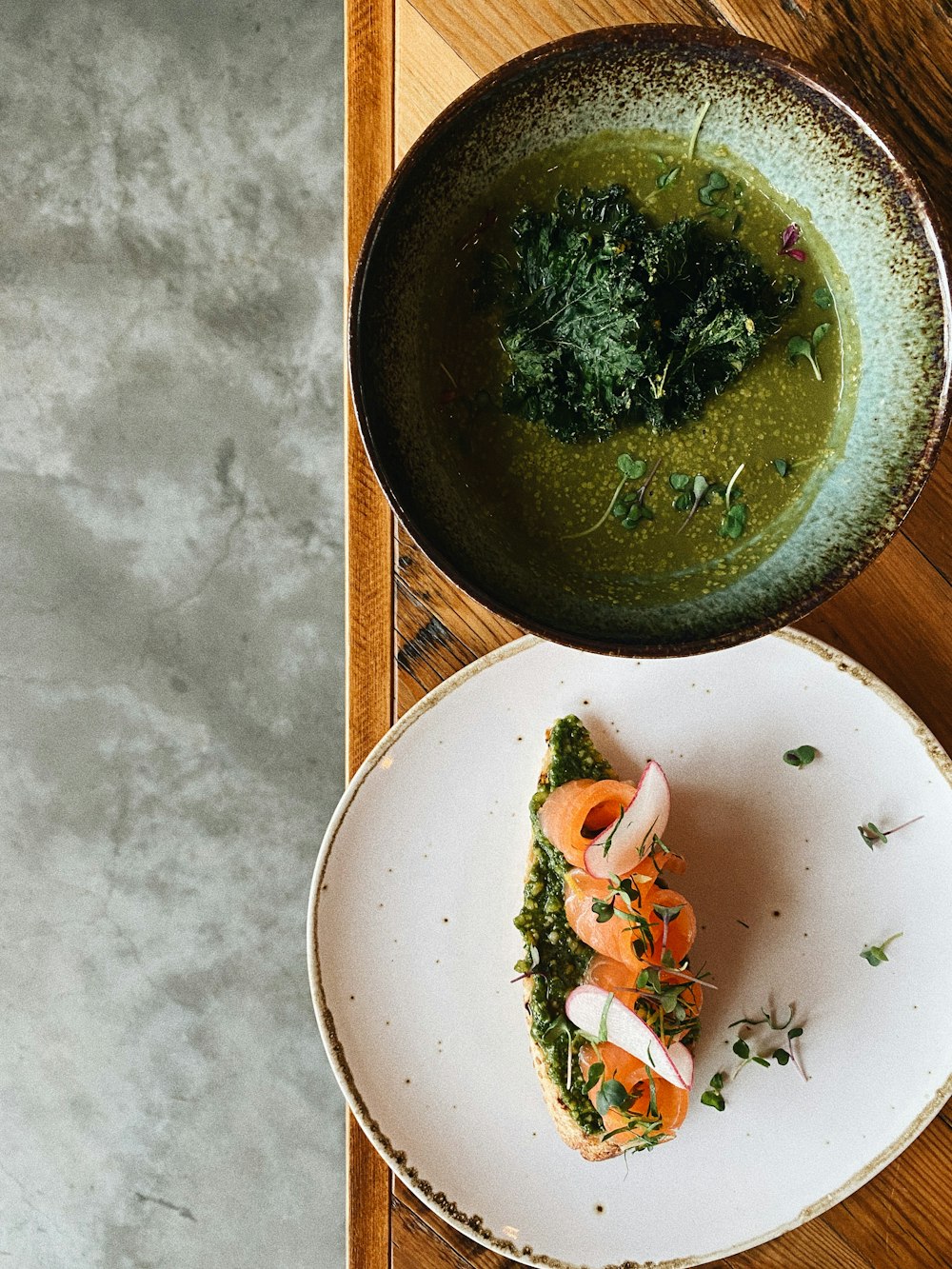 green soup on white ceramic bowl