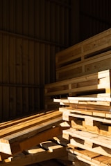 brown wooden pallet stack on brown wooden floor