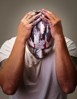person in white crew neck t-shirt