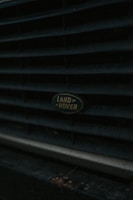 Close-up of a pristine Land Rover engine part with clear brand markings.