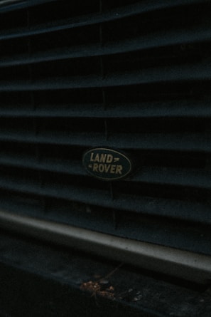 Close-up of a pristine Land Rover engine part with clear brand markings.