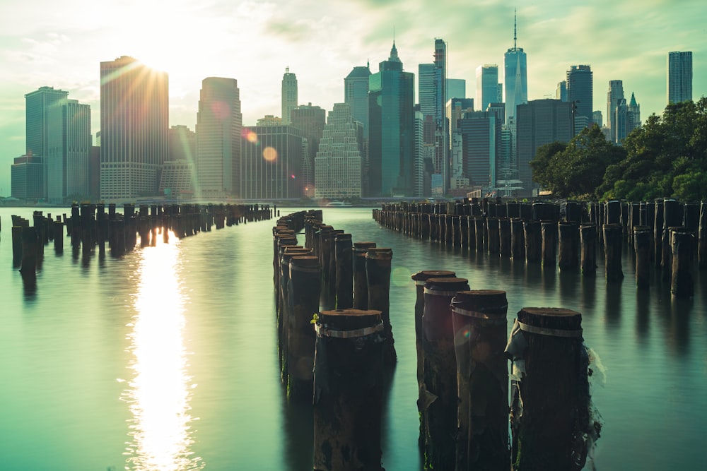 body of water near city buildings during daytime