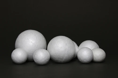 Catalyst materials arranged on a clean white surface.