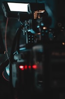 Close-up of modern electronic equipment including stage lighting controls and LED panels