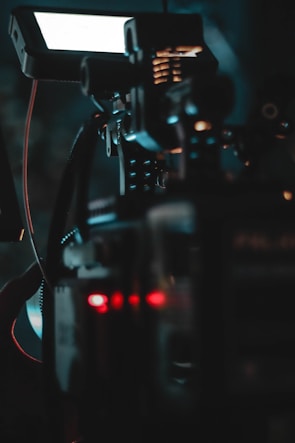 A close-up of a director reviewing technical equipment.