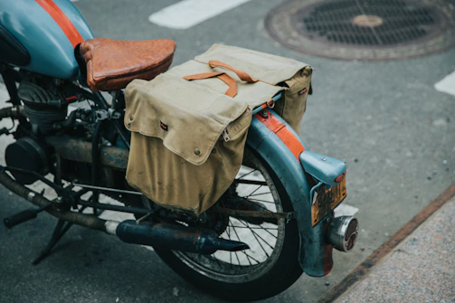 Yamaha motorcycle saddlebags attached to a sleek bike in a city setting.