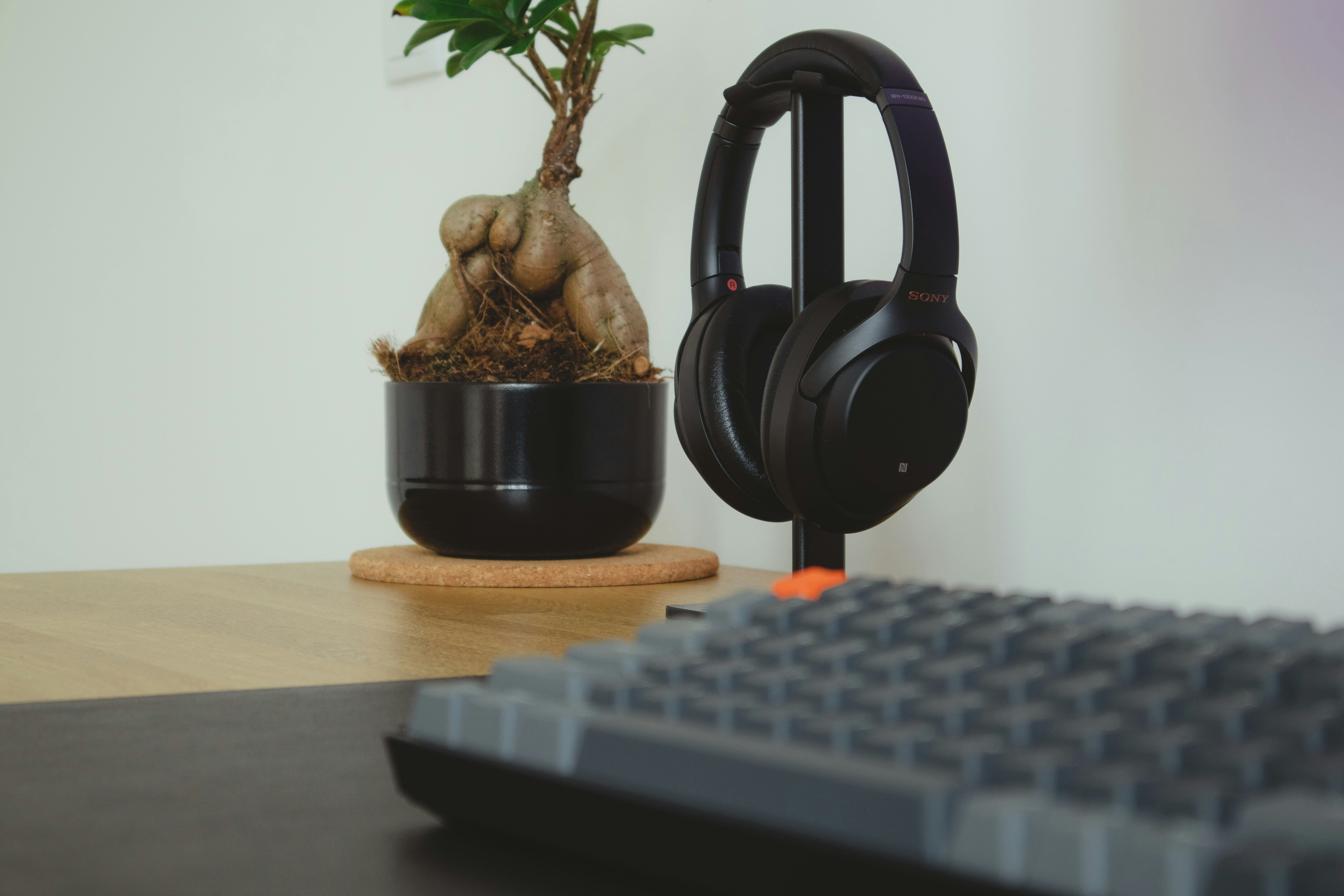 slim carbon fiber mixed reality headset sitting on a minimalist desk