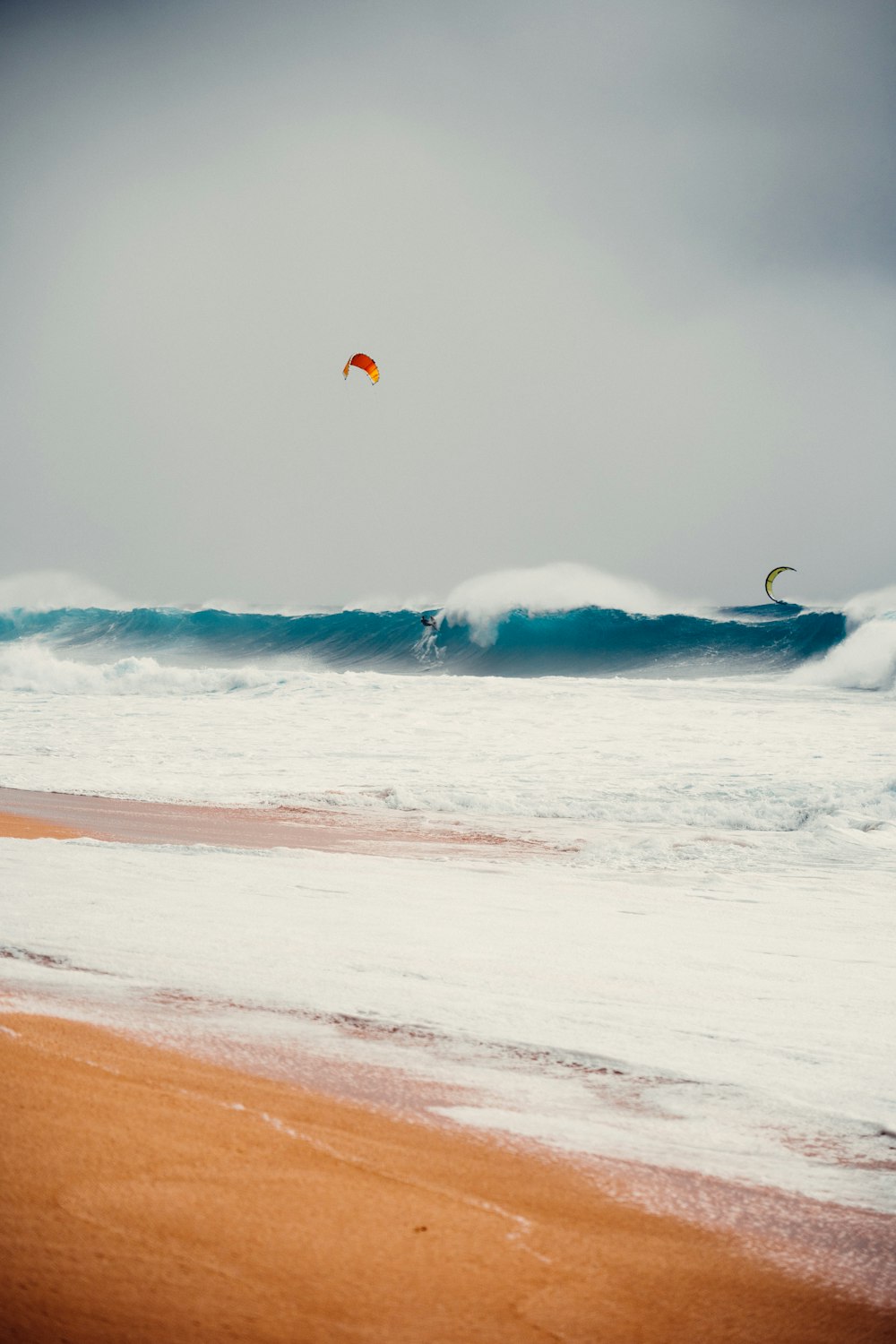 person surfing on sea waves during daytime