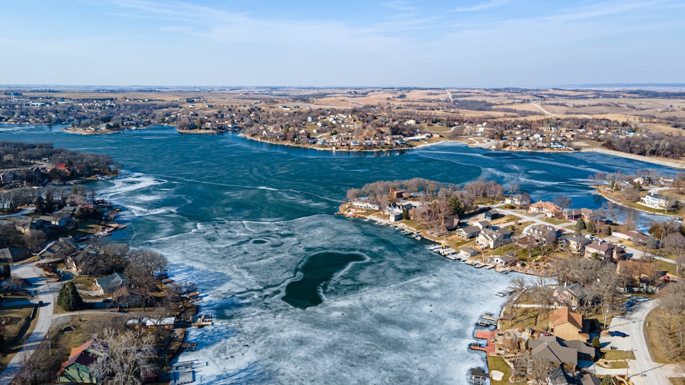 aerial view of city near body of water during daytime