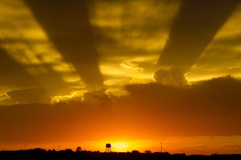 silhouette of buildings during sunset