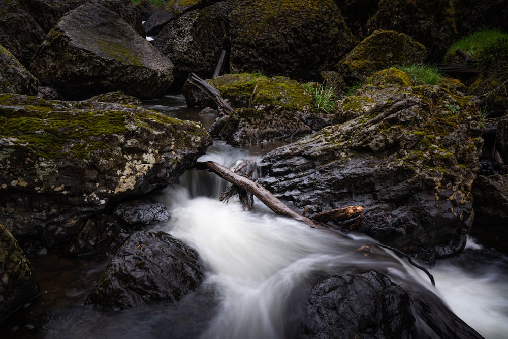 water falls on rocky mountain