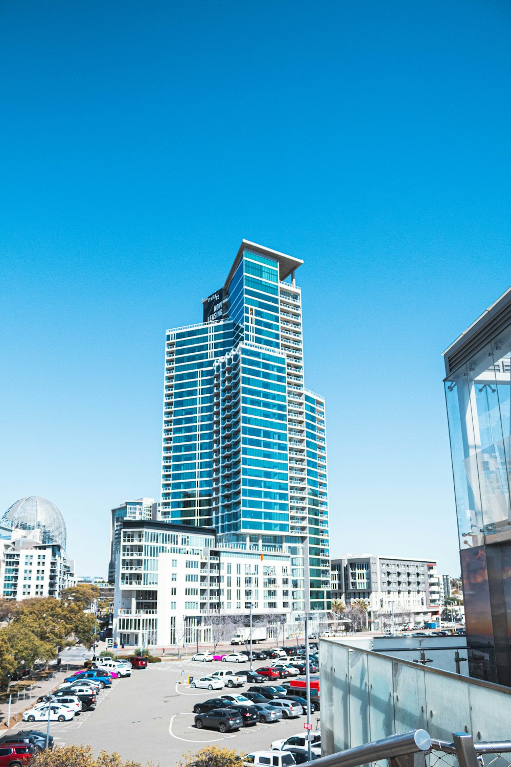 white and blue concrete building under blue sky during daytime