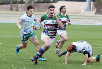 A vibrant image of the Kingfish rugby team in action.