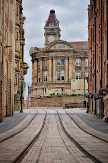 a clock tower on top of a building in a city