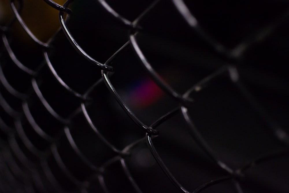 close up photo of black metal fence