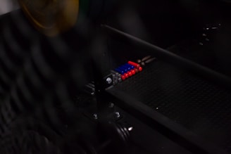 Close-up of high-purity cobalt hydroxide samples arranged on a slate grey industrial table